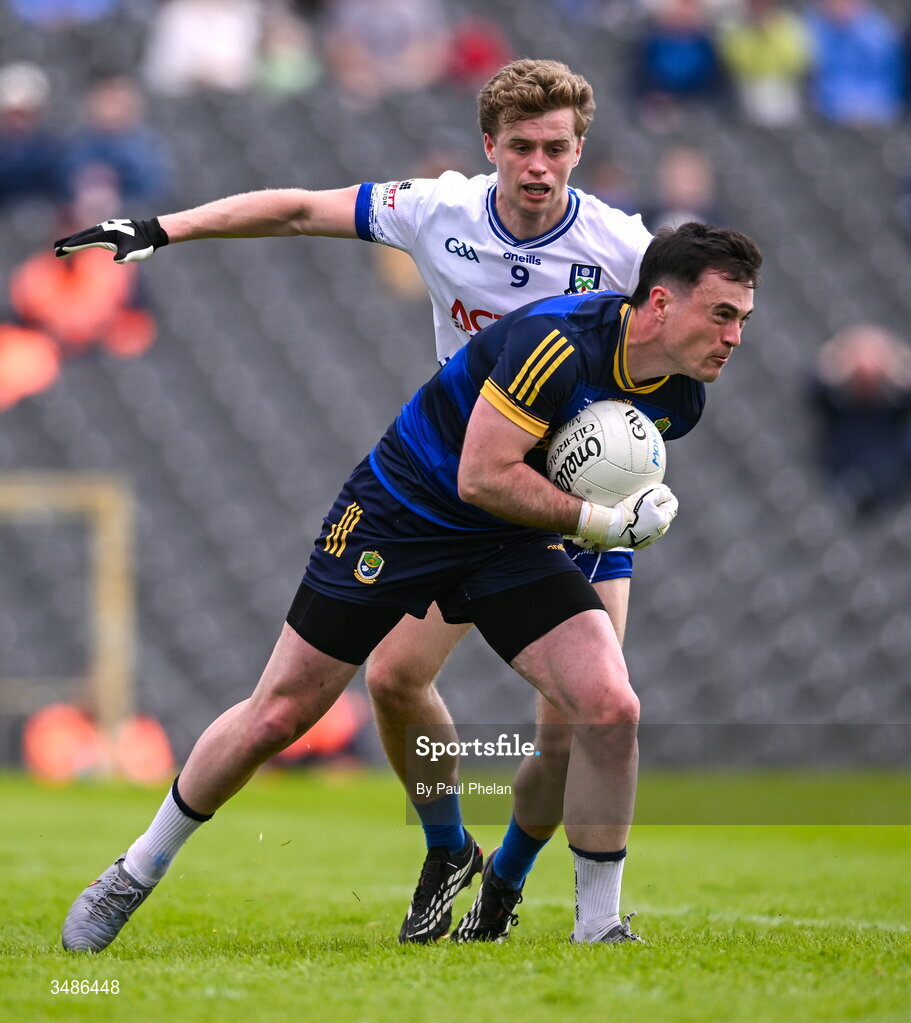 13 June 2026; Roscommon goalkeeper Conor Carroll in action against Karl Gallagher of Monaghan during the GAA Football All-Ireland Senior Championship Round 2B match between Monaghan and Roscommon at St. Tiernach's Park in Clones, Monaghan. Photo by Paul Phelan/Sportsfile