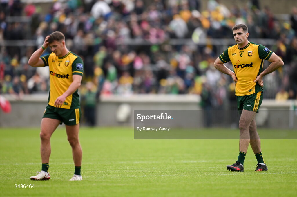13 June 2026; Caolan McGonagle, right, and Peadar Mogan of Donegal after their side's defeat in the GAA Football All-Ireland Senior Championship Round 2A match between Donegal and Cork at MacCumhaill Park in Ballybofey, Donegal. Photo by Ramsey Cardy/Sportsfile