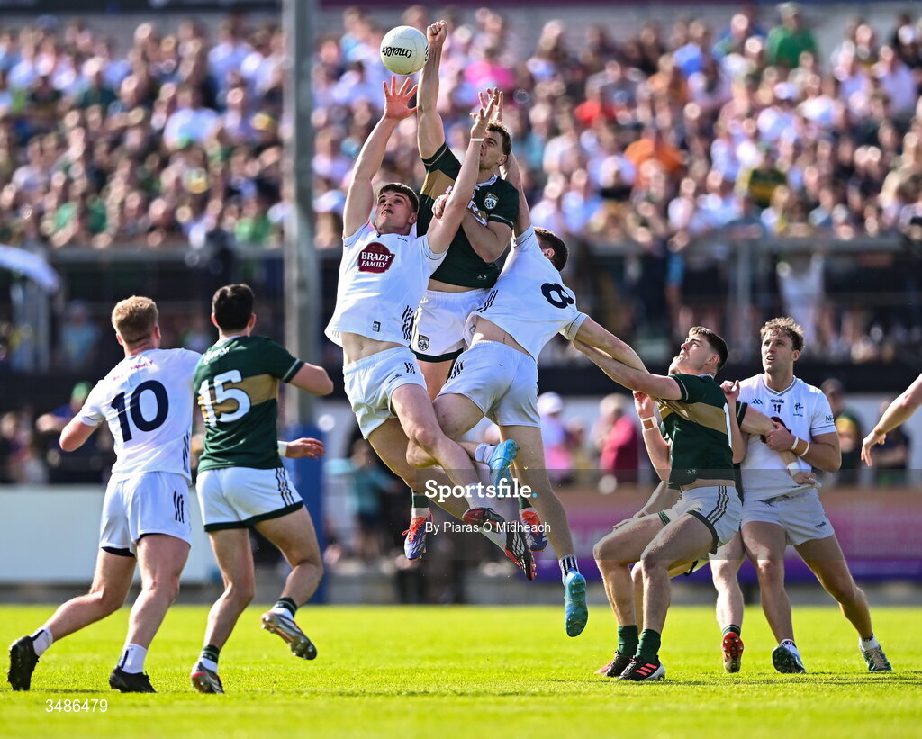 13 June 2026; Seán O'Brien of Kerry in action against Brendan Gibbons and Kevin Feely, 8, of Kildare during the GAA Football All-Ireland Senior Championship Round 2B match between Kildare and Kerry at Cedral St Conleth's Park in Newbridge, Kildare. Photo by Piaras Ó Mídheach/Sportsfile