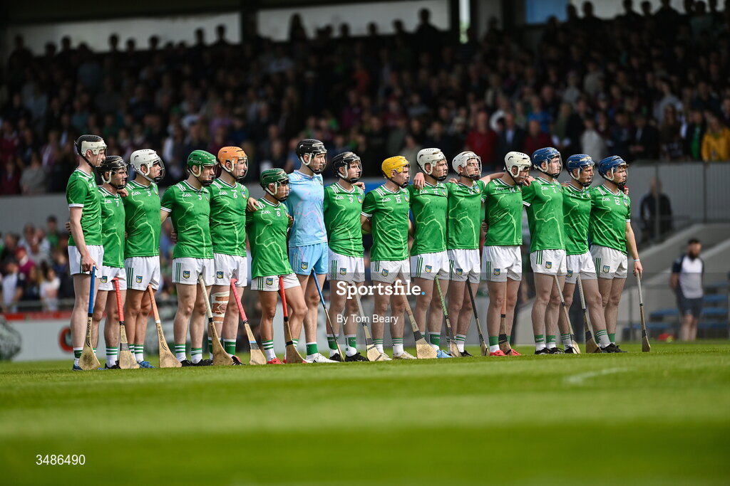13 June 2026; Limerick players stand for the playing of Amhrán na bhFiann ahead of the Electric Ireland All-Ireland Minor Hurling Championship semi-final match between Galway and Limerick at Zimmer Biomet Páirc Chíosóg in Ennis, Clare. Photo by Tom Beary/Sportsfile