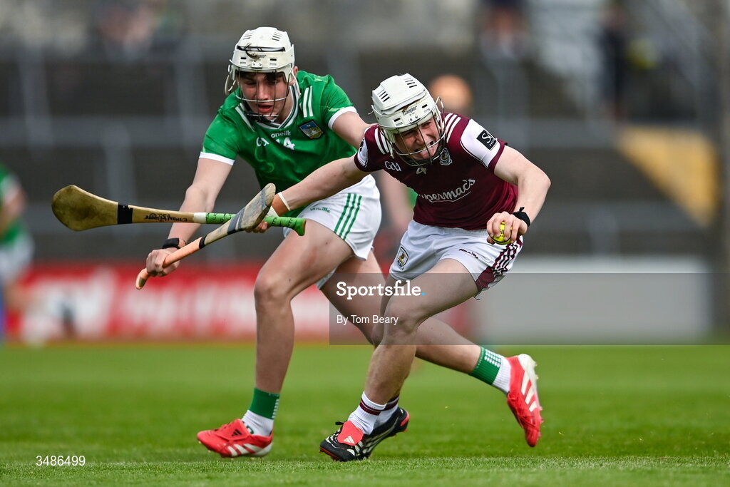 13 June 2026; Ethan Whyte of Galway is tackled by Zach Bennis of Limerick during the Electric Ireland All-Ireland Minor Hurling Championship semi-final match between Galway and Limerick at Zimmer Biomet Páirc Chíosóg in Ennis, Clare. Photo by Tom Beary/Sportsfile