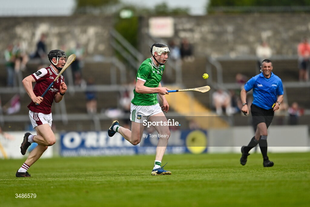 13 June 2026; Diarmuid Crowe of Limerick races clear of Cathal Donoghue of Galway during the Electric Ireland All-Ireland Minor Hurling Championship semi-final match between Galway and Limerick at Zimmer Biomet Páirc Chíosóg in Ennis, Clare. Photo by Tom Beary/Sportsfile