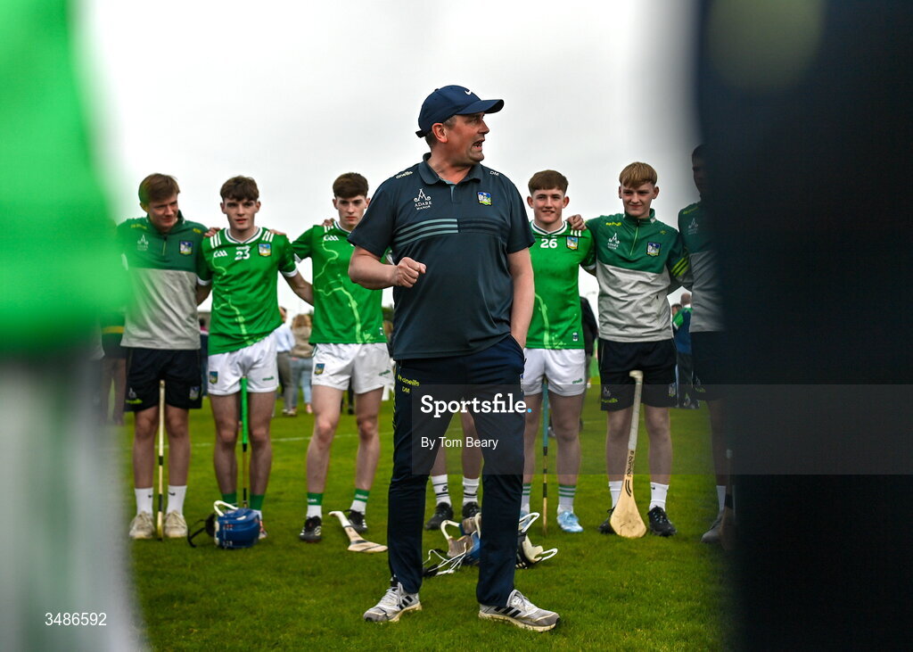 13 June 2026; Limerick manager Diarmuid Mullins speaks to his players after the Electric Ireland All-Ireland Minor Hurling Championship semi-final match between Galway and Limerick at Zimmer Biomet Páirc Chíosóg in Ennis, Clare. Photo by Tom Beary/Sportsfile
