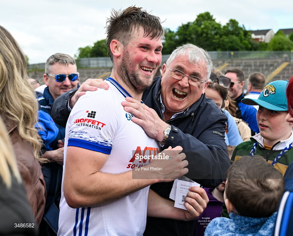13 June 2026; Andrew Woods of Monaghan celebrates with a former Monaghan player Gerry McCarville after the GAA Football All-Ireland Senior Championship Round 2B match between Monaghan and Roscommon at St. Tiernach's Park in Clones, Monaghan. Photo by Paul Phelan/Sportsfile