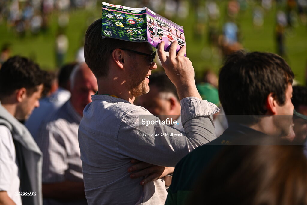13 June 2026; A spectator uses his match programme to shield his eyes from the sun during the GAA Football All-Ireland Senior Championship Round 2B match between Kildare and Kerry at Cedral St Conleth's Park in Newbridge, Kildare. Photo by Piaras Ó Mídheach/Sportsfile
