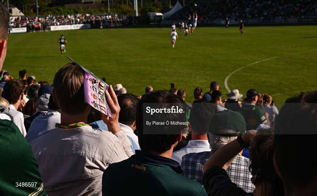 13 June 2026; A spectator uses his match programme to shield his eyes from the sun during the GAA Football All-Ireland Senior Championship Round 2B match between Kildare and Kerry at Cedral St Conleth's Park in Newbridge, Kildare. Photo by Piaras Ó Mídheach/Sportsfile