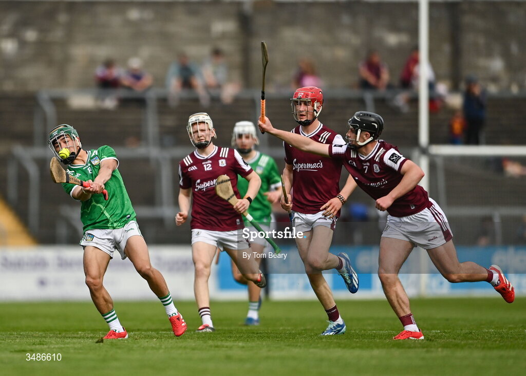 13 June 2026; Xavier Neligan of Limerick in action against Ultan Leen of Galway during the Electric Ireland All-Ireland Minor Hurling Championship semi-final match between Galway and Limerick at Zimmer Biomet Páirc Chíosóg in Ennis, Clare. Photo by Tom Beary/Sportsfile