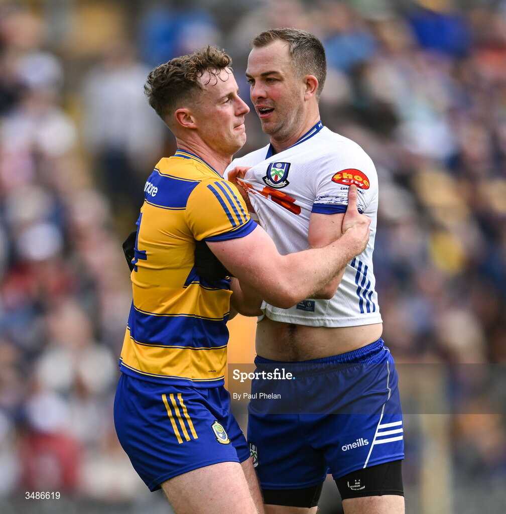 13 June 2026; Eoin McCormack of Roscommon and Jack McCarron of Monaghan tussle during the GAA Football All-Ireland Senior Championship Round 2B match between Monaghan and Roscommon at St. Tiernach's Park in Clones, Monaghan. Photo by Paul Phelan/Sportsfile