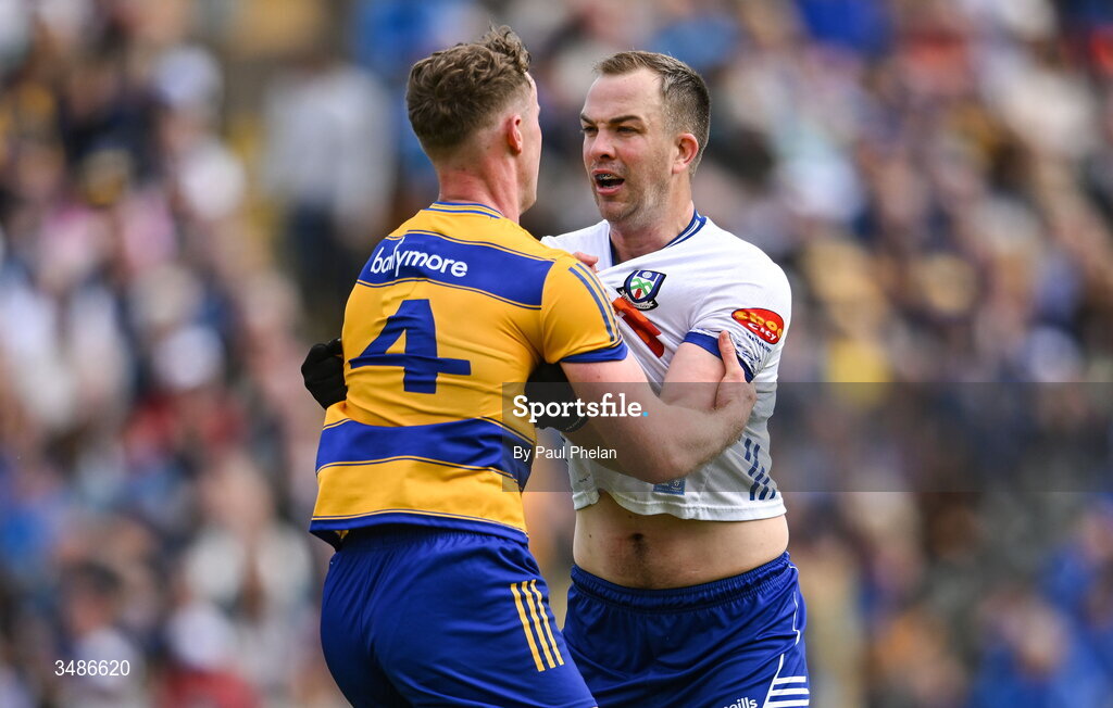 13 June 2026; Eoin McCormack of Roscommon and Jack McCarron of Monaghan tussle during the GAA Football All-Ireland Senior Championship Round 2B match between Monaghan and Roscommon at St. Tiernach's Park in Clones, Monaghan. Photo by Paul Phelan/Sportsfile
