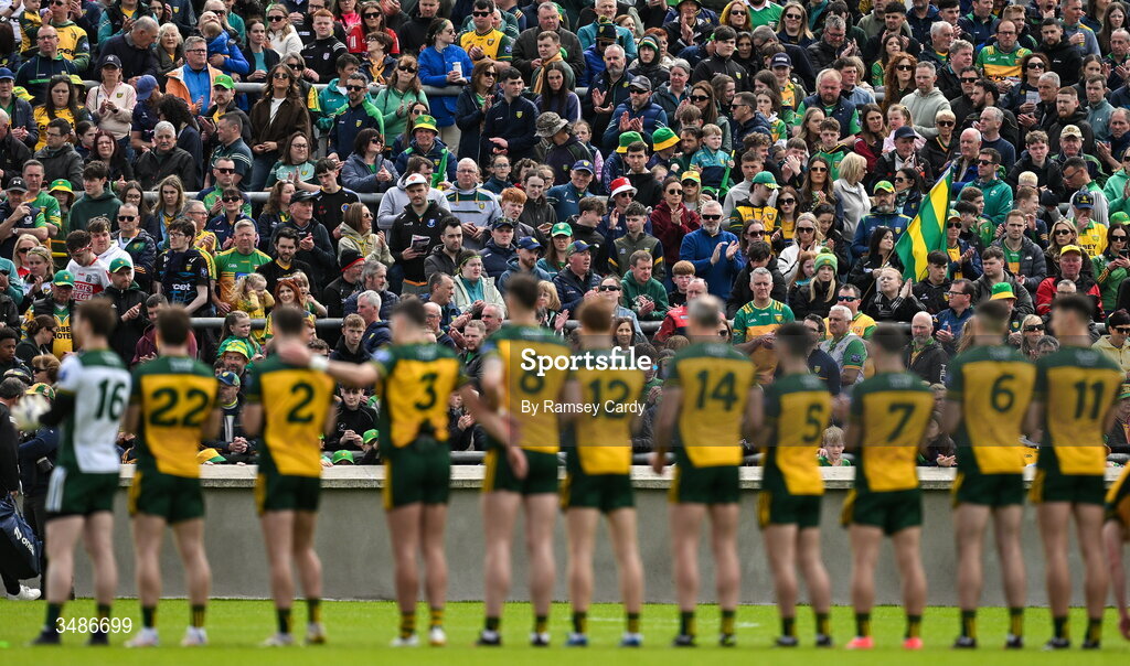 13 June 2026; Supporters and the Donegal team during the playing of the National Anthem before the GAA Football All-Ireland Senior Championship Round 2A match between Donegal and Cork at MacCumhaill Park in Ballybofey, Donegal. Photo by Ramsey Cardy/Sportsfile