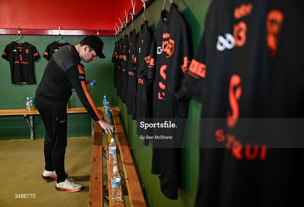 14 June 2026; Armagh GAA PRO Finbar Burns applies the finishing touches inside the Armagh dressing room before the GAA Football All-Ireland Senior Championship Round 2A match between Louth and Armagh at Páirc Grattan in Inniskeen, Monaghan. Photo by Ben McShane/Sportsfile
