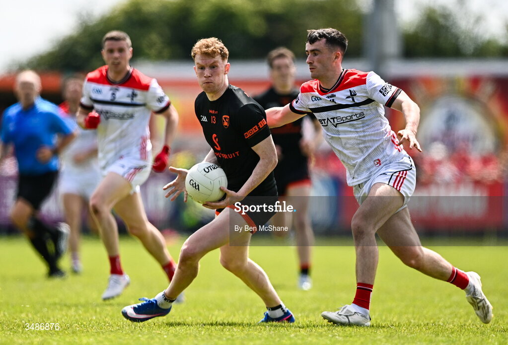 14 June 2026; Conor Turbitt of Armagh in action against Daire Nally of Louth during the GAA Football All-Ireland Senior Championship Round 2A match between Louth and Armagh at Páirc Grattan in Inniskeen, Monaghan. Photo by Ben McShane/Sportsfile