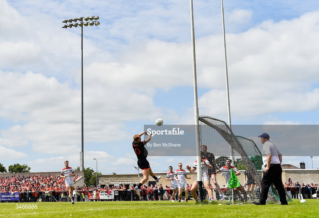 14 June 2026; Cian McConville of Armagh punches goalward during the GAA Football All-Ireland Senior Championship Round 2A match between Louth and Armagh at Páirc Grattan in Inniskeen, Monaghan. Photo by Ben McShane/Sportsfile