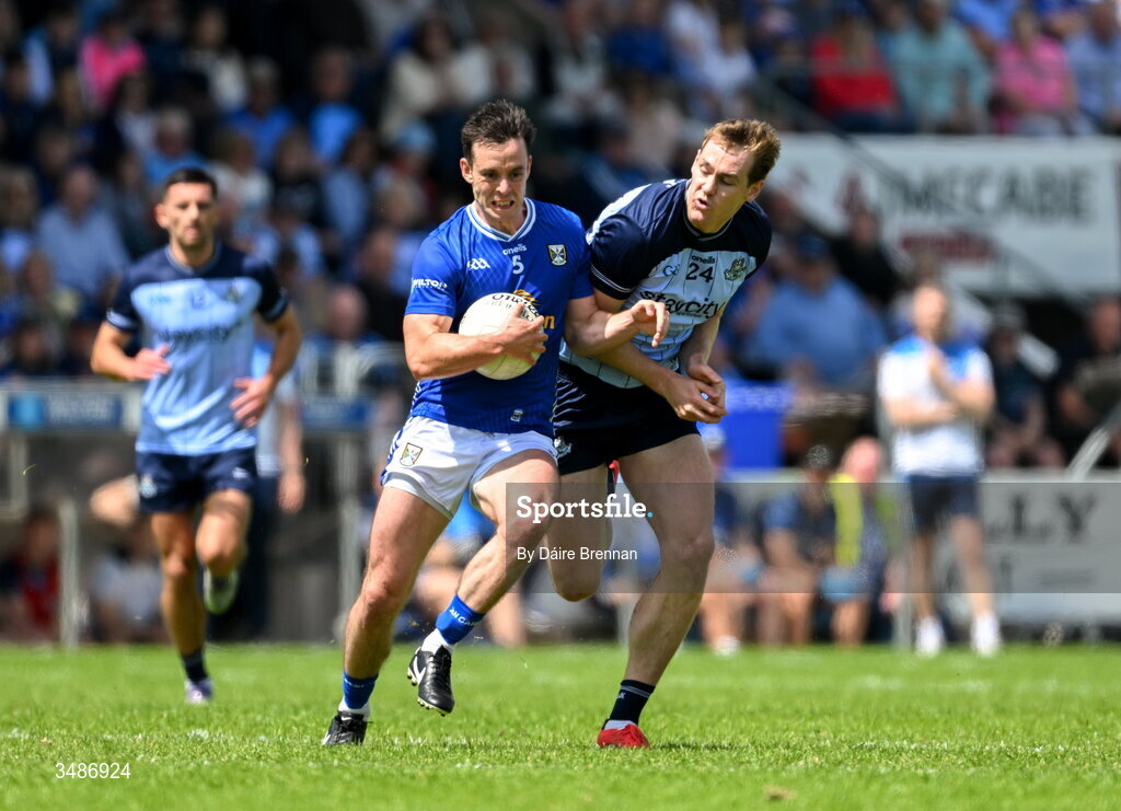 14 June 2026; Gerard Smith of Cavan in action against Peadar Ó Cofaigh Byrne of Dublin during the GAA Football All-Ireland Senior Championship Round 2B match between Cavan and Dublin at Kingspan Breffni in Cavan. Photo by Daire Brennan/Sportsfile