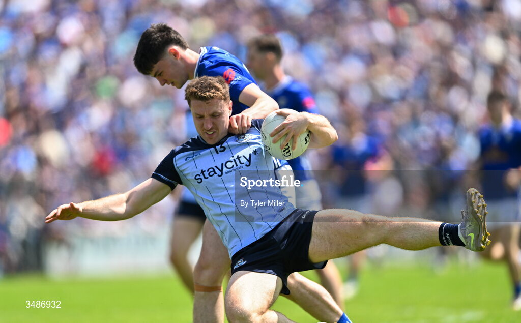 14 June 2026; Paddy Small of Dublin is fouled by Jensen Tynan of Cavan during the GAA Football All-Ireland Senior Championship Round 2B match between Cavan and Dublin at Kingspan Breffni in Cavan. Photo by Tyler Miller/Sportsfile