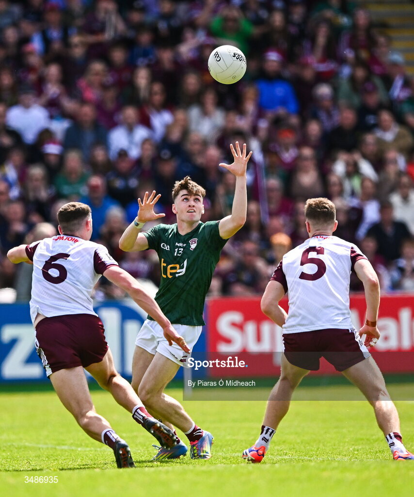 14 June 2026; Shane Corcoran of Westmeath in action against John Daly, left, and Dylan McHugh of Galway during the GAA Football All-Ireland Senior Championship Round 2A match between Galway and Westmeath at Pearse Stadium in Salthill, Galway. Photo by Piaras Ó Mídheach/Sportsfile