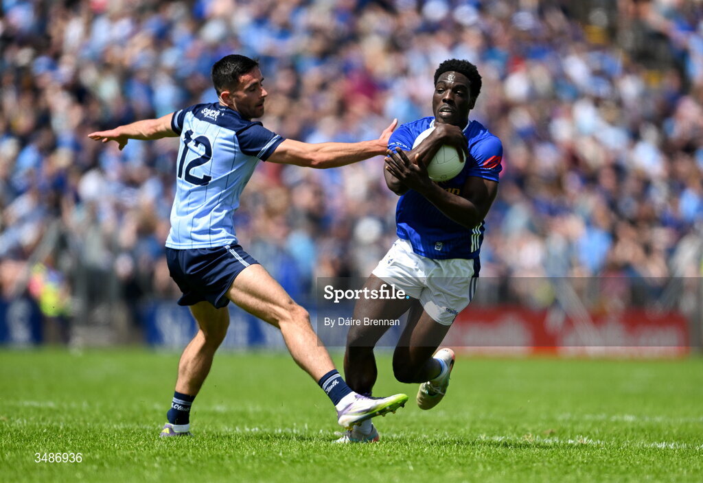14 June 2026; Emmanuel Shehu of Cavan in action against Niall Scully of Dublin during the GAA Football All-Ireland Senior Championship Round 2B match between Cavan and Dublin at Kingspan Breffni in Cavan. Photo by Daire Brennan/Sportsfile