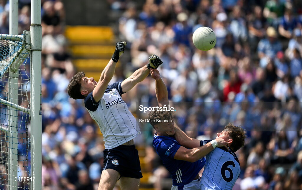 14 June 2026; Evan Comerford, left, and Charlie McMorrow of Dublin in action against Conor Brady of Cavan during the GAA Football All-Ireland Senior Championship Round 2B match between Cavan and Dublin at Kingspan Breffni in Cavan. Photo by Daire Brennan/Sportsfile