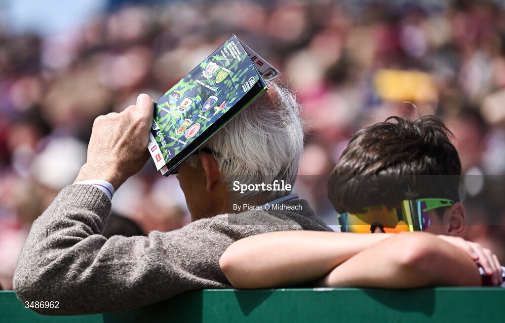 14 June 2026; Supporters shield themselves from the sun during the GAA Football All-Ireland Senior Championship Round 2A match between Galway and Westmeath at Pearse Stadium in Salthill, Galway. Photo by Piaras Ó Mídheach/Sportsfile