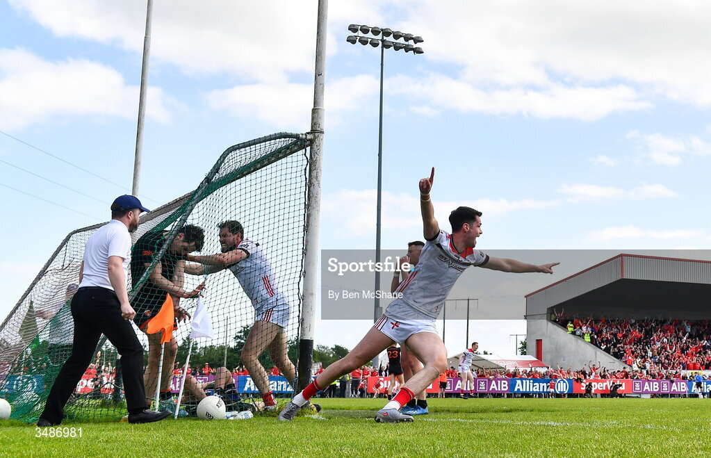 14 June 2026; Conall McCaul of Louth celebrates after his side's winning goal, after the ball dropped into the net from the hands of Armagh goalkeeper Ethan Rafferty, during the GAA Football All-Ireland Senior Championship Round 2A match between Louth and Armagh at Páirc Grattan in Inniskeen, Monaghan. Photo by Ben McShane/Sportsfile