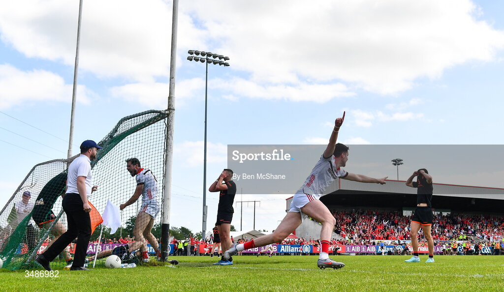 14 June 2026; Conall McCaul of Louth celebrates after his side's winning goal, after the ball dropped into the net from the hands of Armagh goalkeeper Ethan Rafferty, during the GAA Football All-Ireland Senior Championship Round 2A match between Louth and Armagh at Páirc Grattan in Inniskeen, Monaghan. Photo by Ben McShane/Sportsfile