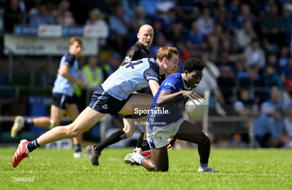 14 June 2026; Emmanuel Shehu of Cavan in action against Peadar Ó Cofaigh Byrne of Dublin during the GAA Football All-Ireland Senior Championship Round 2B match between Cavan and Dublin at Kingspan Breffni in Cavan. Photo by Daire Brennan/Sportsfile