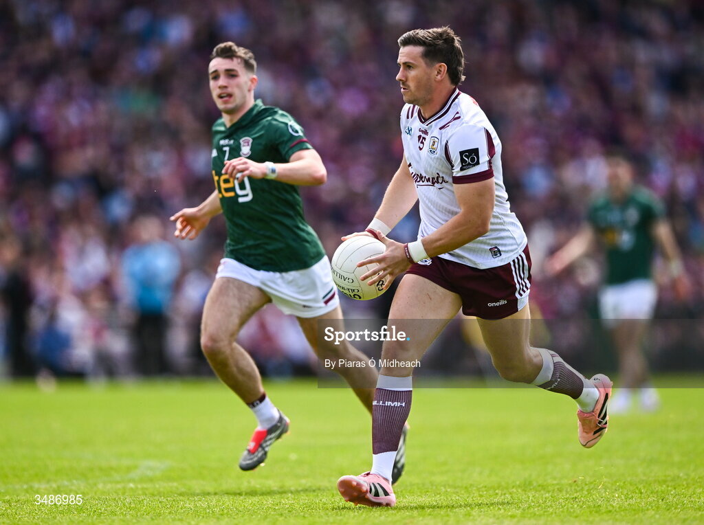 14 June 2026; Shane Walsh of Galway gets away from Matthew Whittaker of Westmeath during the GAA Football All-Ireland Senior Championship Round 2A match between Galway and Westmeath at Pearse Stadium in Salthill, Galway. Photo by Piaras Ó Mídheach/Sportsfile