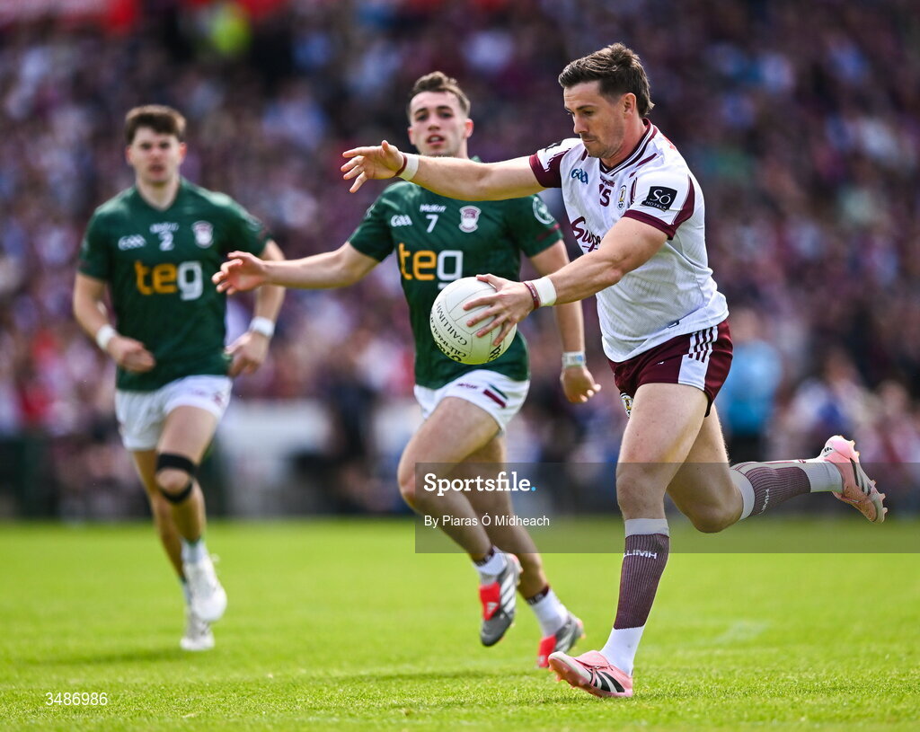 14 June 2026; Shane Walsh of Galway gets away from Matthew Whittaker of Westmeath during the GAA Football All-Ireland Senior Championship Round 2A match between Galway and Westmeath at Pearse Stadium in Salthill, Galway. Photo by Piaras Ó Mídheach/Sportsfile