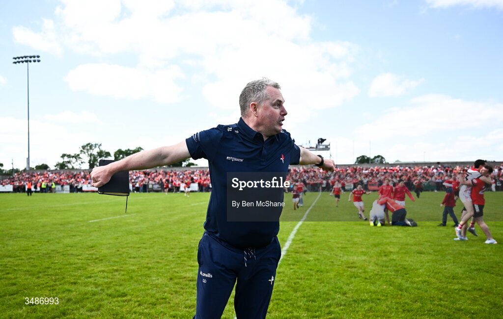 14 June 2026; Louth manager Gavin Devlin celebrates after the GAA Football All-Ireland Senior Championship Round 2A match between Louth and Armagh at Páirc Grattan in Inniskeen, Monaghan. Photo by Ben McShane/Sportsfile