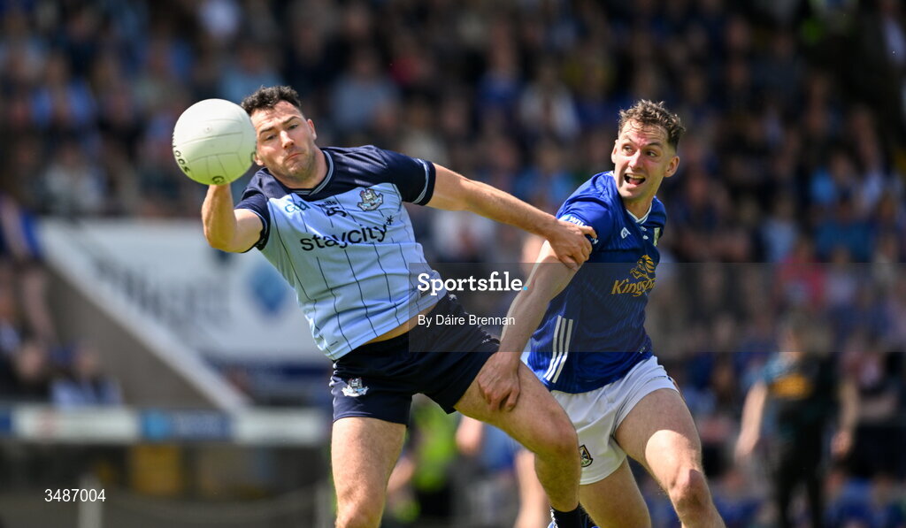 14 June 2026; Colm Basquel of Dublin in action against Brían O'Connell of Cavan during the GAA Football All-Ireland Senior Championship Round 2B match between Cavan and Dublin at Kingspan Breffni in Cavan. Photo by Daire Brennan/Sportsfile
