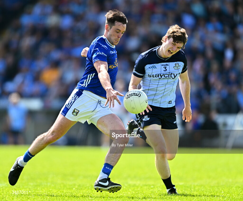 14 June 2026; Gerard Smith of Cavan has an attempt on goal despite the efforts of Nathan Doran of Dublin during the GAA Football All-Ireland Senior Championship Round 2B match between Cavan and Dublin at Kingspan Breffni in Cavan. Photo by Tyler Miller/Sportsfile