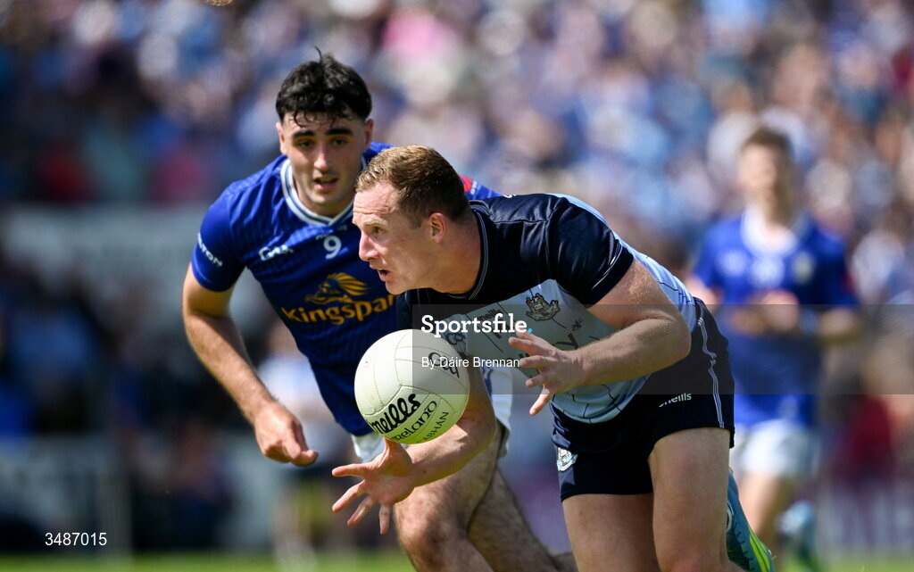 14 June 2026; Ciarán Kilkenny of Dublin in action against Ryan Donohoe of Cavan during the GAA Football All-Ireland Senior Championship Round 2B match between Cavan and Dublin at Kingspan Breffni in Cavan. Photo by Daire Brennan/Sportsfile
