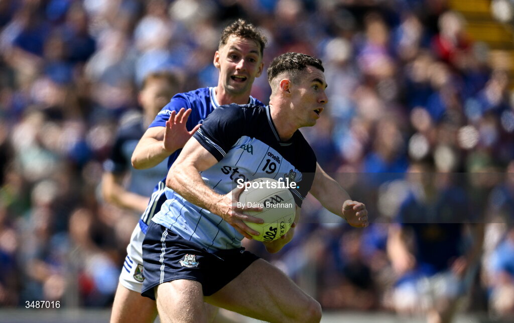 14 June 2026; Lee Gannon of Dublin in action against Brían O'Connell of Cavan during the GAA Football All-Ireland Senior Championship Round 2B match between Cavan and Dublin at Kingspan Breffni in Cavan. Photo by Daire Brennan/Sportsfile