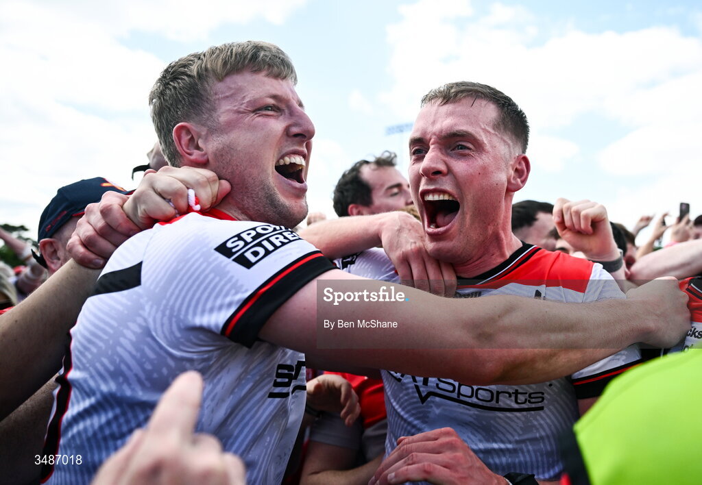 14 June 2026; Paul Matthews, left, and Ciaran Byrne of Louth celebrate after the GAA Football All-Ireland Senior Championship Round 2A match between Louth and Armagh at Páirc Grattan in Inniskeen, Monaghan. Photo by Ben McShane/Sportsfile