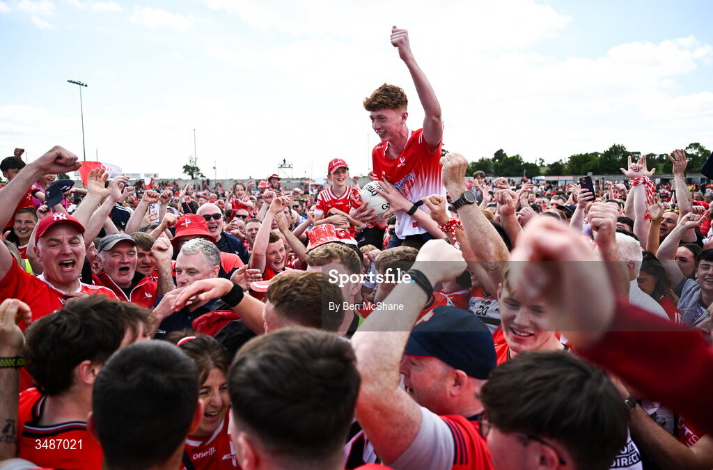 14 June 2026; Louth supporters celebrate after the GAA Football All-Ireland Senior Championship Round 2A match between Louth and Armagh at Páirc Grattan in Inniskeen, Monaghan. Photo by Ben McShane/Sportsfile