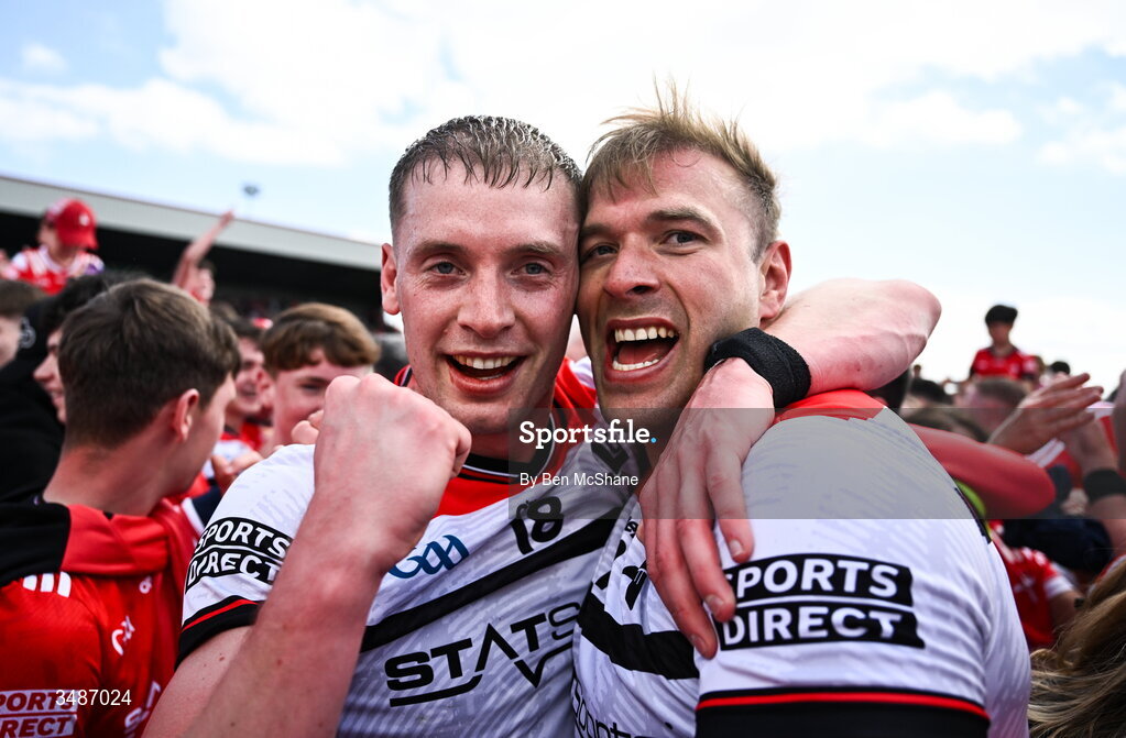 14 June 2026; Ciaran Byrne, left, and Conor Grimes of Louth celebrate after the GAA Football All-Ireland Senior Championship Round 2A match between Louth and Armagh at Páirc Grattan in Inniskeen, Monaghan. Photo by Ben McShane/Sportsfile