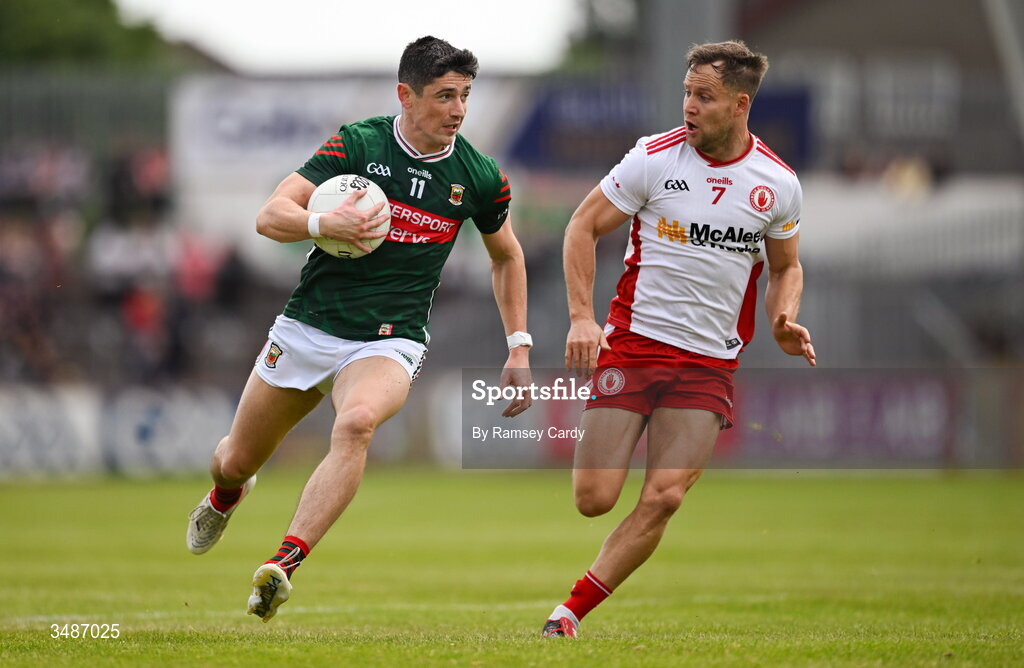 14 June 2026; Conor Loftus of Mayo in action against Kieran McGeary of Tyrone during the GAA Football All-Ireland Senior Championship Round 2A match between Tyrone and Mayo at O’Neills Healy Park in Omagh, Tyrone. Photo by Ramsey Cardy/Sportsfile