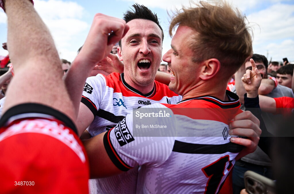 14 June 2026; Tommy Durnin, left, celebrates with Louth teammate Conor Grimes after their victory in the GAA Football All-Ireland Senior Championship Round 2A match between Louth and Armagh at Páirc Grattan in Inniskeen, Monaghan. Photo by Ben McShane/Sportsfile