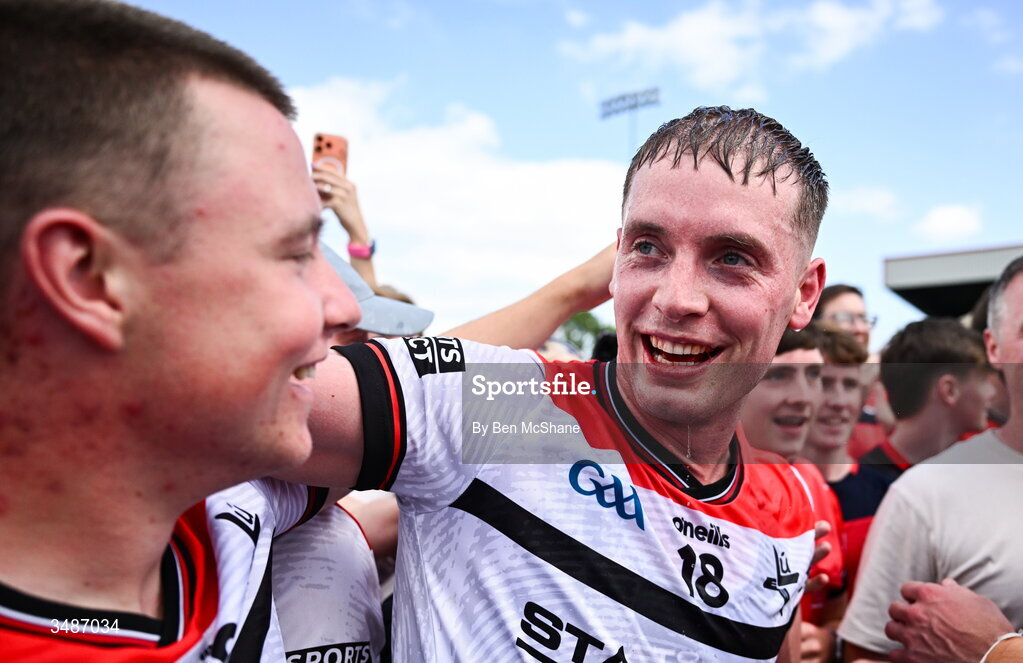14 June 2026; Conor MacCriosta, left, and Ciaran Byrne of Louth celebrate after the GAA Football All-Ireland Senior Championship Round 2A match between Louth and Armagh at Páirc Grattan in Inniskeen, Monaghan. Photo by Ben McShane/Sportsfile