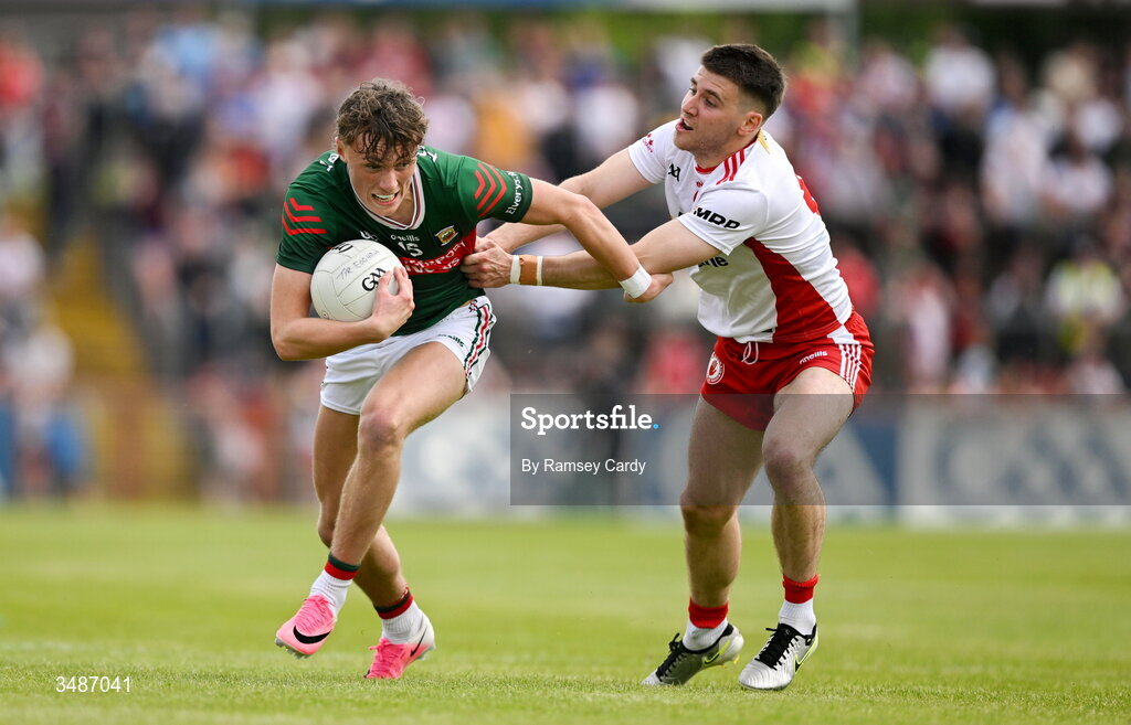 14 June 2026; Kobe McDonald of Mayo in action against Niall Devlin of Tyrone during the GAA Football All-Ireland Senior Championship Round 2A match between Tyrone and Mayo at O’Neills Healy Park in Omagh, Tyrone. Photo by Ramsey Cardy/Sportsfile