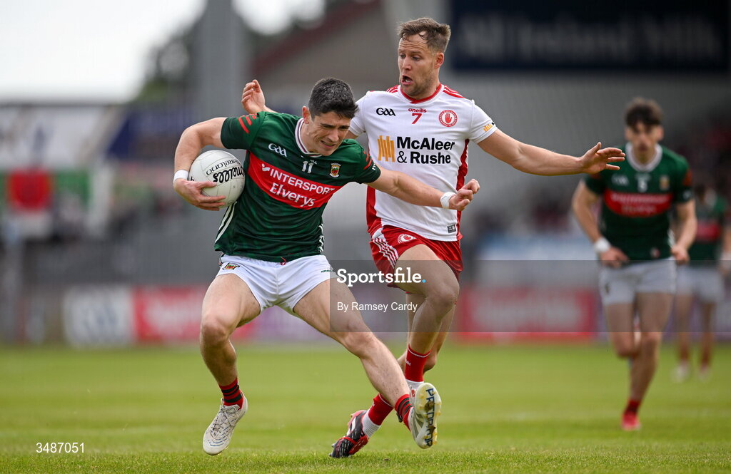 14 June 2026; Conor Loftus of Mayo in action against Kieran McGeary of Tyrone during the GAA Football All-Ireland Senior Championship Round 2A match between Tyrone and Mayo at O’Neills Healy Park in Omagh, Tyrone. Photo by Ramsey Cardy/Sportsfile