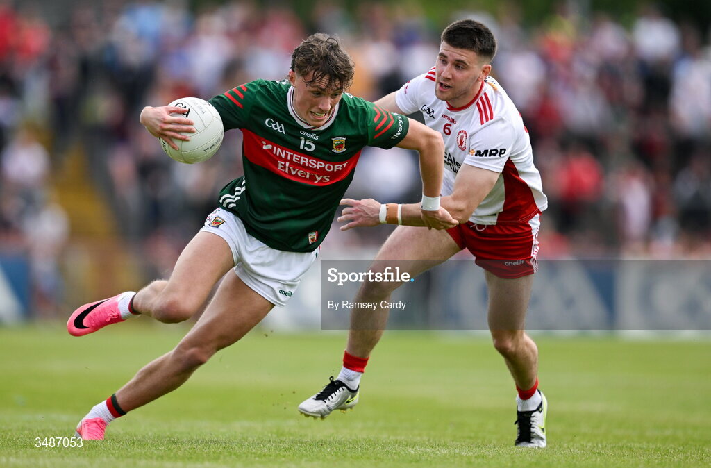 14 June 2026; Kobe McDonald of Mayo in action against Niall Devlin of Tyrone during the GAA Football All-Ireland Senior Championship Round 2A match between Tyrone and Mayo at O’Neills Healy Park in Omagh, Tyrone. Photo by Ramsey Cardy/Sportsfile