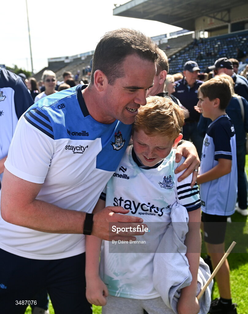 14 June 2026; Dublin manager Ger Brennan with his nephew Noah O'Brien Brennan, aged 11, after the GAA Football All-Ireland Senior Championship Round 2B match between Cavan and Dublin at Kingspan Breffni in Cavan. Photo by Daire Brennan/Sportsfile
