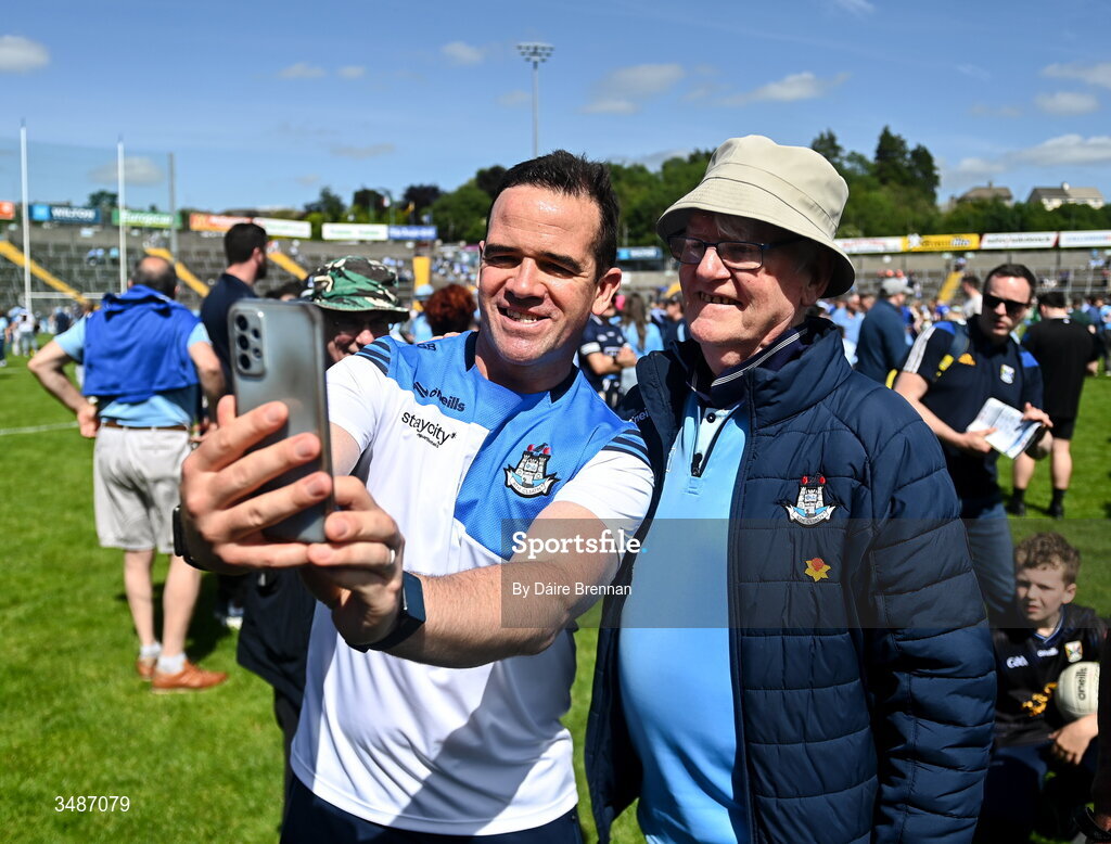 14 June 2026; Dublin manager Ger Brennan takes a selfie with Dublin supporter Michael Cassidy after the GAA Football All-Ireland Senior Championship Round 2B match between Cavan and Dublin at Kingspan Breffni in Cavan. Photo by Daire Brennan/Sportsfile