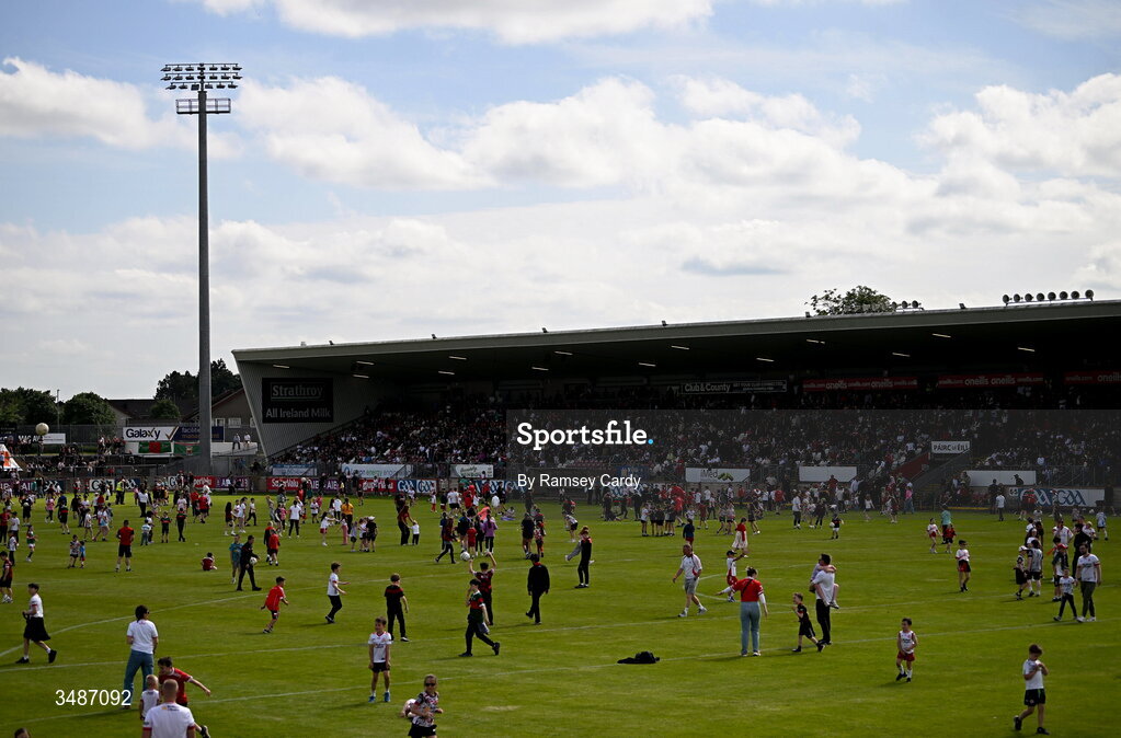 14 June 2026; Supporters on the pitch at half-time of the GAA Football All-Ireland Senior Championship Round 2A match between Tyrone and Mayo at O’Neills Healy Park in Omagh, Tyrone. Photo by Ramsey Cardy/Sportsfile