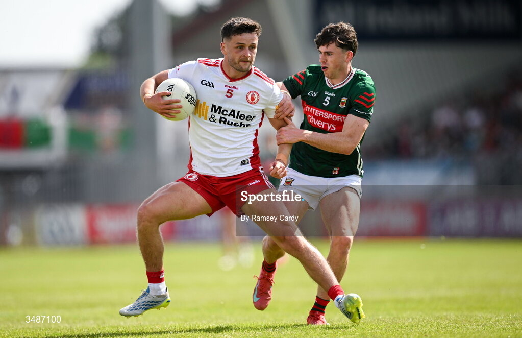 14 June 2026; Michael McKernan of Tyrone in action against Sam Callinan of Mayo during the GAA Football All-Ireland Senior Championship Round 2A match between Tyrone and Mayo at O’Neills Healy Park in Omagh, Tyrone. Photo by Ramsey Cardy/Sportsfile