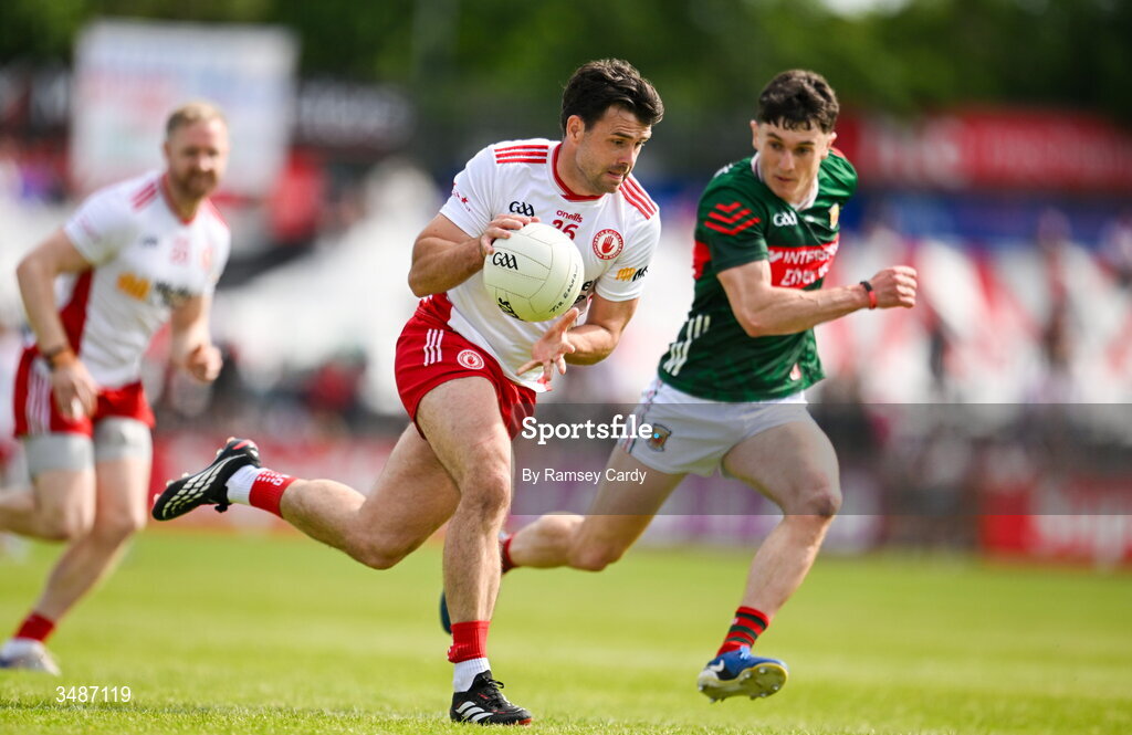 14 June 2026; Darren McCurry of Tyrone in action against Jack Coyne of Mayo during the GAA Football All-Ireland Senior Championship Round 2A match between Tyrone and Mayo at O’Neills Healy Park in Omagh, Tyrone. Photo by Ramsey Cardy/Sportsfile