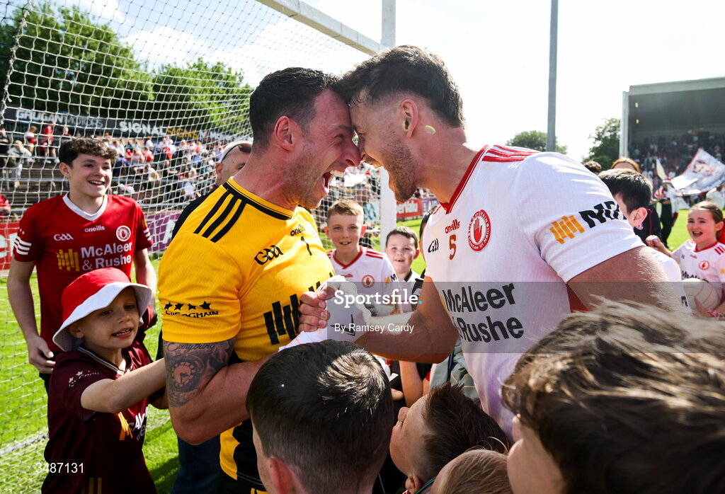 14 June 2026; Tyrone players Niall Morgan, left, and Michael McKernan celebrate after the GAA Football All-Ireland Senior Championship Round 2A match between Tyrone and Mayo at O’Neills Healy Park in Omagh, Tyrone. Photo by Ramsey Cardy/Sportsfile