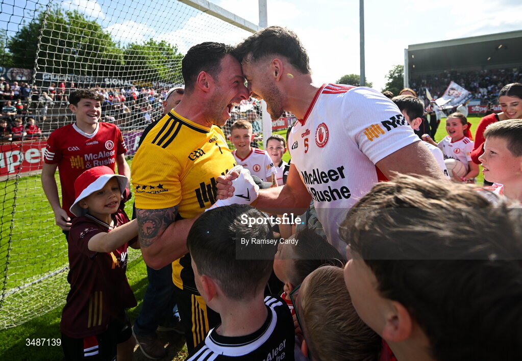 14 June 2026; Tyrone players Niall Morgan, left, and Michael McKernan celebrate after the GAA Football All-Ireland Senior Championship Round 2A match between Tyrone and Mayo at O’Neills Healy Park in Omagh, Tyrone. Photo by Ramsey Cardy/Sportsfile