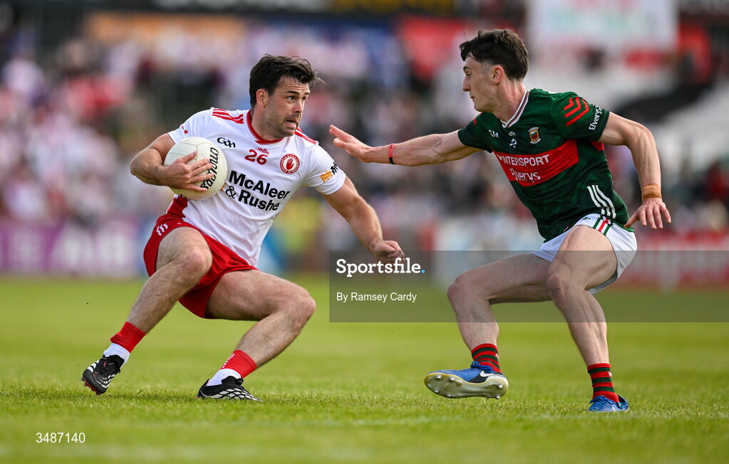14 June 2026; Darren McCurry of Tyrone in action against Jack Coyne of Mayo during the GAA Football All-Ireland Senior Championship Round 2A match between Tyrone and Mayo at O’Neills Healy Park in Omagh, Tyrone. Photo by Ramsey Cardy/Sportsfile